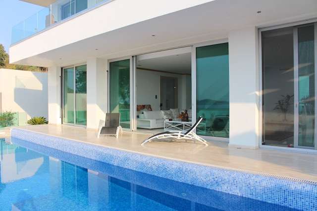  Unique Sea View Gumusluk Villa - Front glass facade