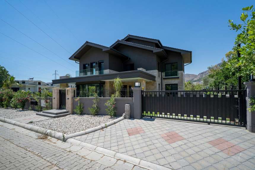 Exquisite brand new Fethiye Property For Sale - View to other side of villa with secure gates