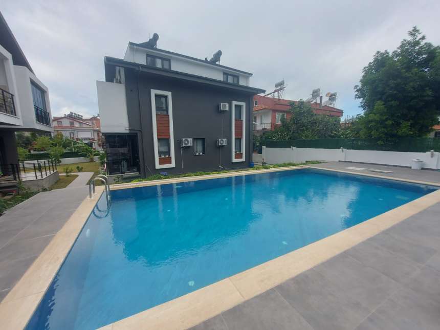 Great location Fethiye Apartment For Sale - Communal pool and sun terraces