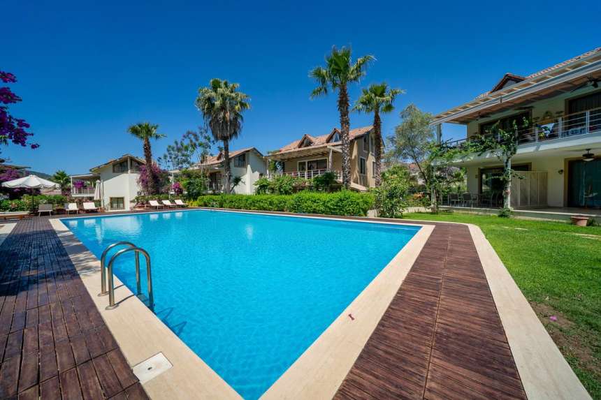 Prestigious Duplex Attic Apartment  in Gocek For Sale - Large swimming pool