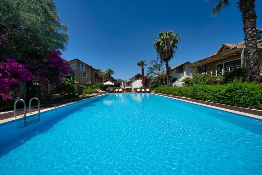 Prestigious Duplex Attic Apartment  in Gocek For Sale - Lovely large swimming pool with sunbathing terraces