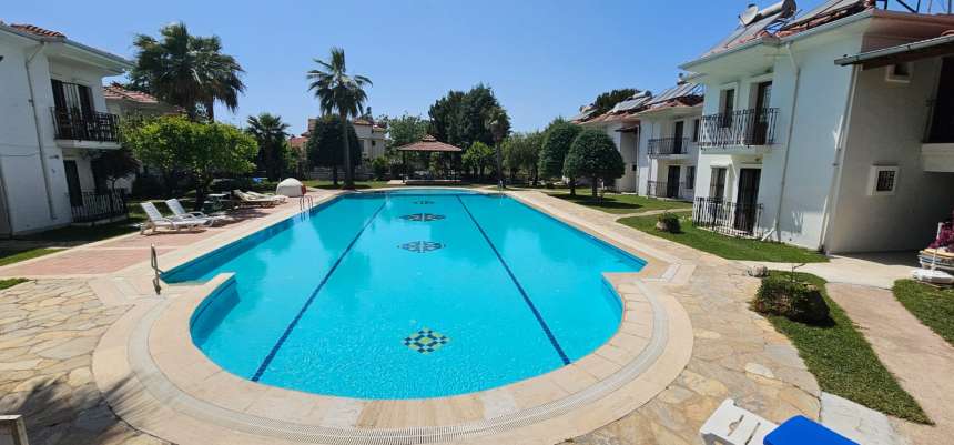 Delightful Garden Floor Apartment In Fethiye For Sale - Large shared swimming pool