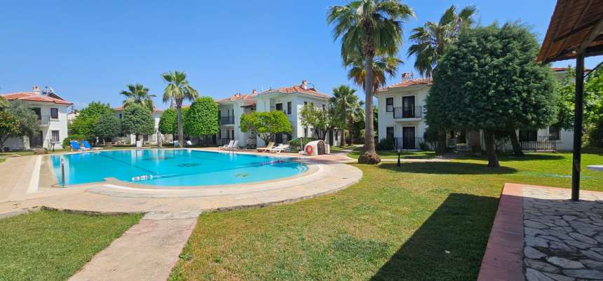 Delightful Garden Floor Apartment In Fethiye For Sale - Gorgeous gardens and pool
