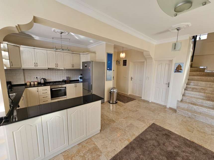 Charming Detached Villa In Fethiye For Sale with Main living area with kitchen and guest WC