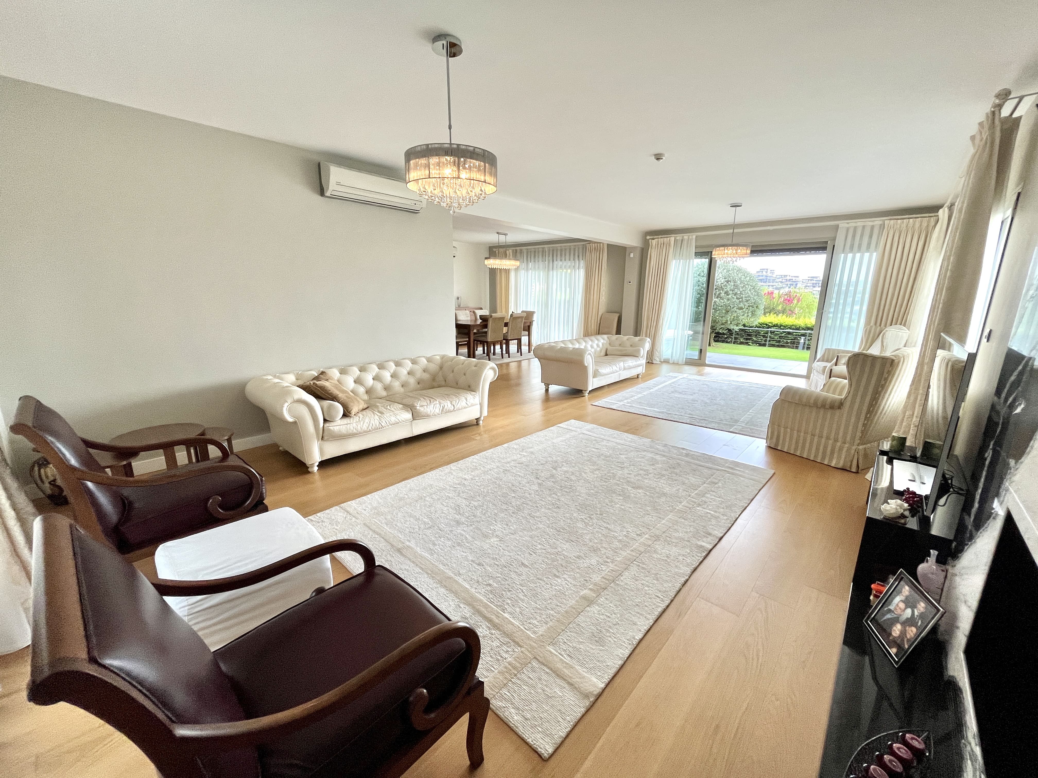 Expansive Istanbul Triplex Villa For Sale - Vast living room with a light and airy atmosphere