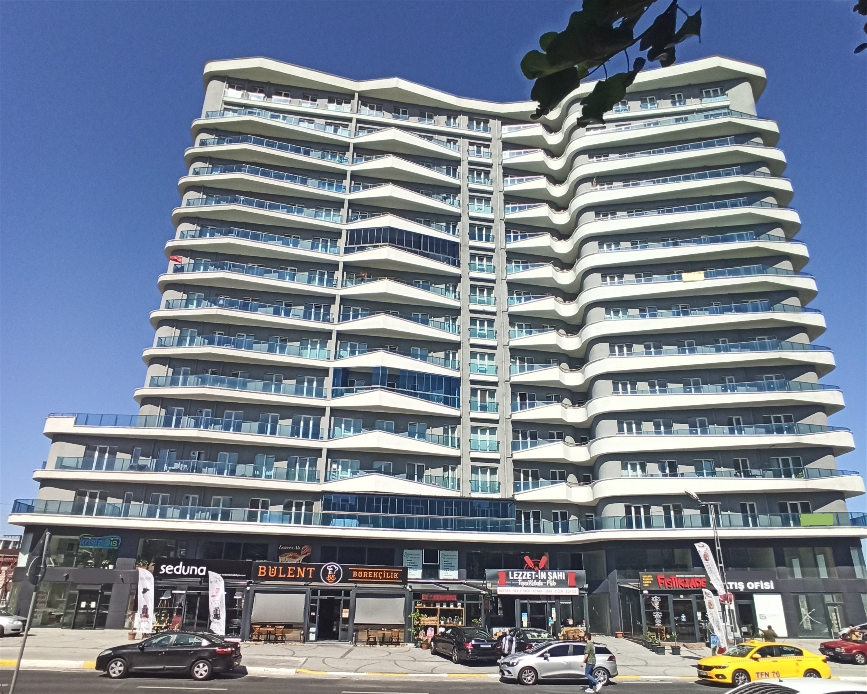 Spacious Istanbul Apartment For Sale - View of apartment block with stores below
