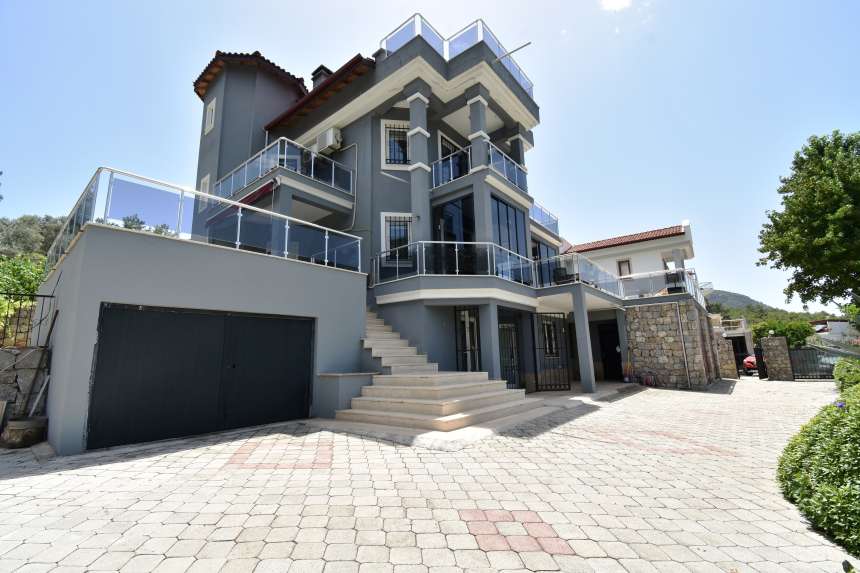 Expansive Detached Villa In Fethiye For Sale with Pool - Private driveway and garage for secure parking