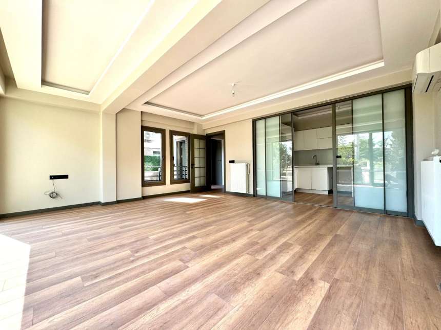 A Spacious Semi-Detached Triplex Villa For Sale In Fethiye - Huge living room/ lounge through to kitchen