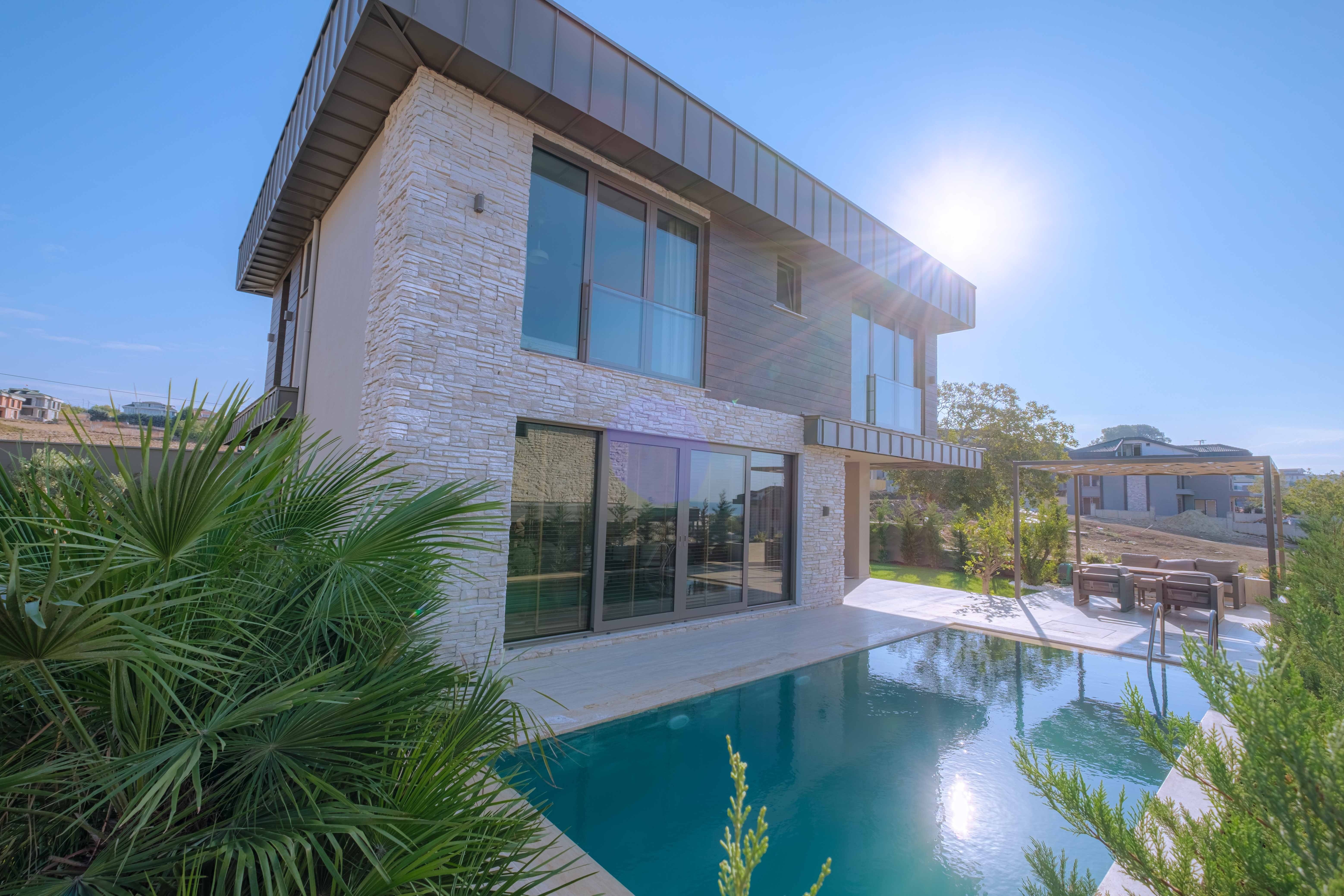 Sea View Villas For Sale in Buyukcekmece, Istanbul - A modern sea view villa with a private pool and large sun terrace