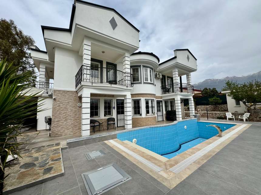 Striking Fethiye Villa For Sale With A Private Pool - Main view of the villa and private pool