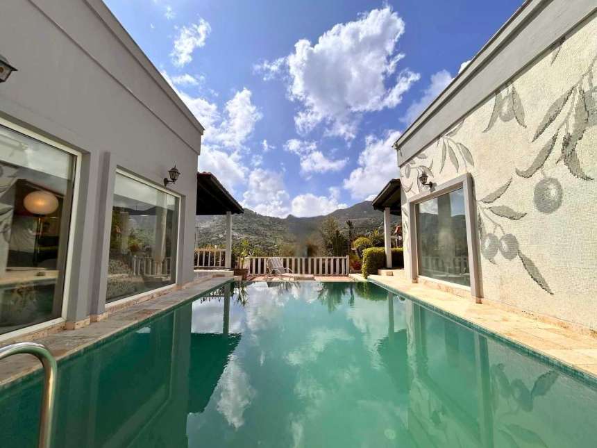 Single-Level Bodrum Property For Sale In Yalikavak - Nature views from the private pool