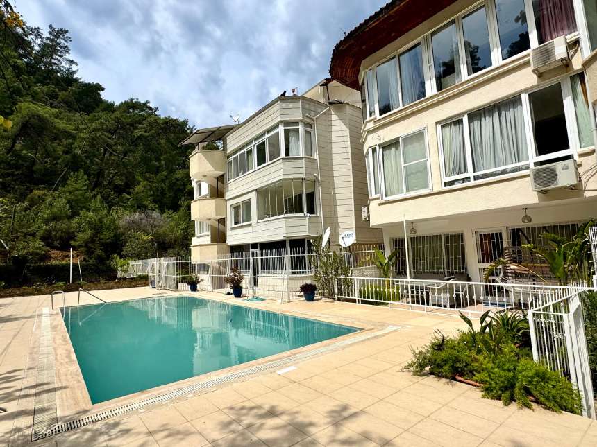 A Renovated Sea-View Fethiye Property For Sale - Penthouse apartment with communal pool