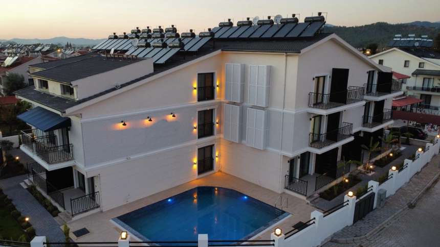 Luxury Property For Sale In Fethiye - Communal pool and gardens