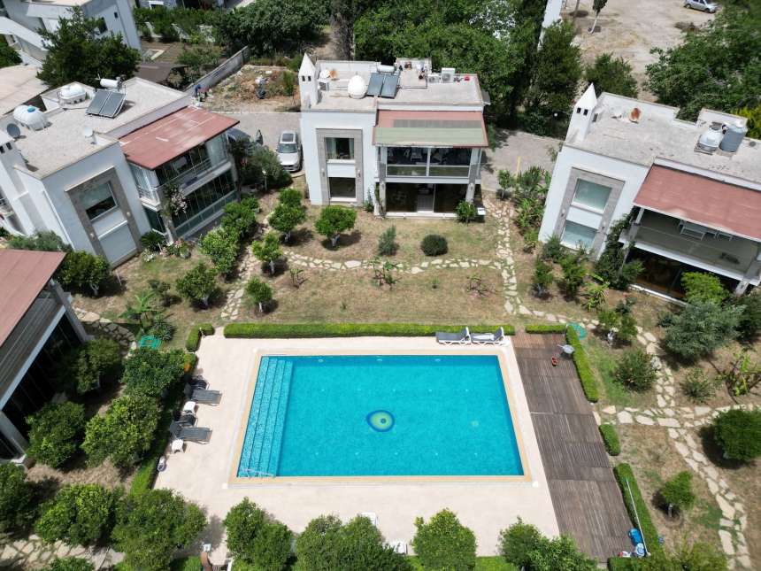 An immaculate Garden Apartment In Bodrum For Sale - Boutique complex with a shared pool