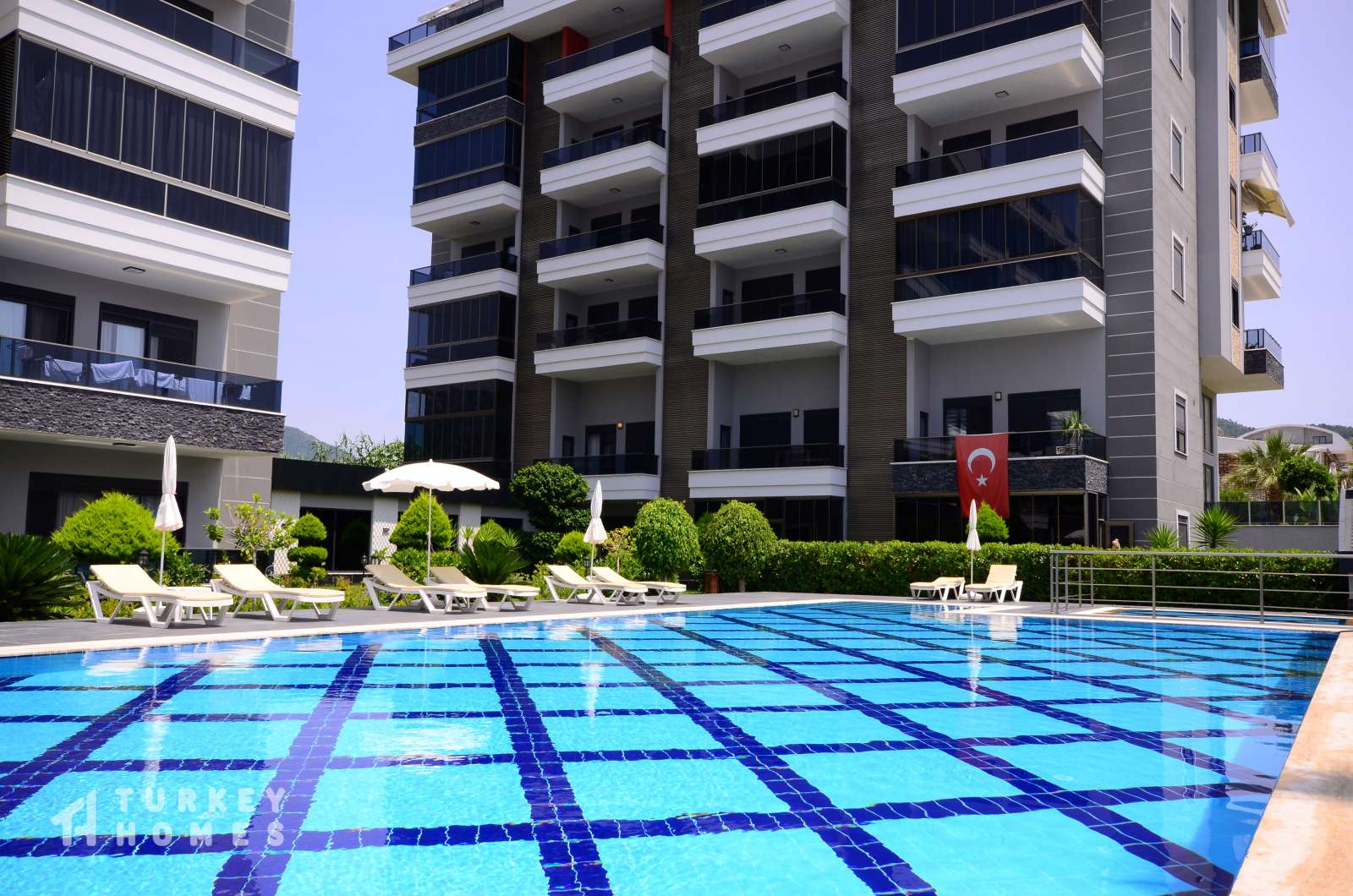 Duplex Garden Apartment For Sale In Alanya - Large shared outdoor pool