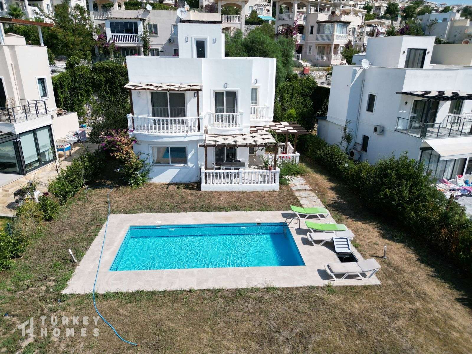 Luxurious Renovated Villa For Sale In Milas, Bogazici - Arial view of the villa and gardens