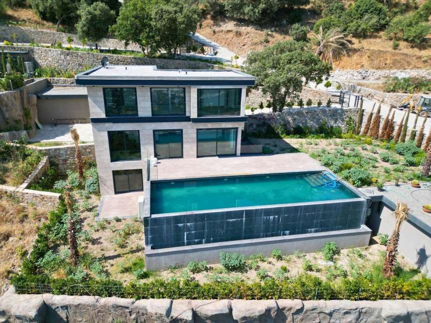 Exceptional Villa With An Infinity Pool & Sea Views For Sale In Bodrum - Main view over the villa and pool