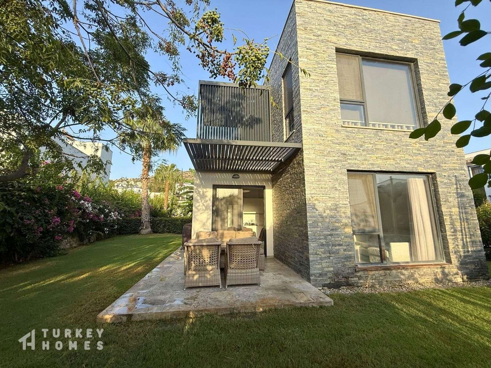 Alluring Garden Apartment In Bodrum For Sale - Main view of the apartment and garden