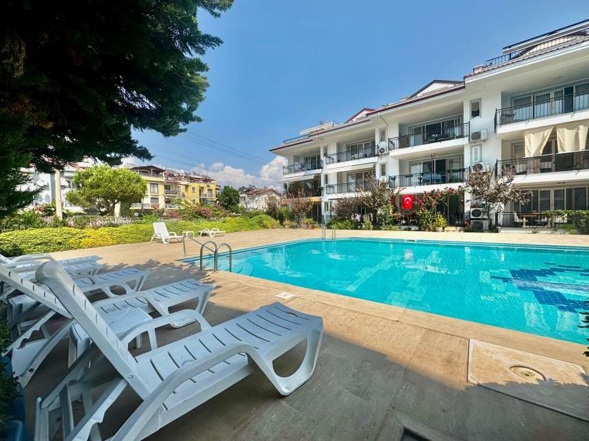 Sea View Fethiye Apartment For Sale Near The Promenade - Communal pool and sunbathing terraces