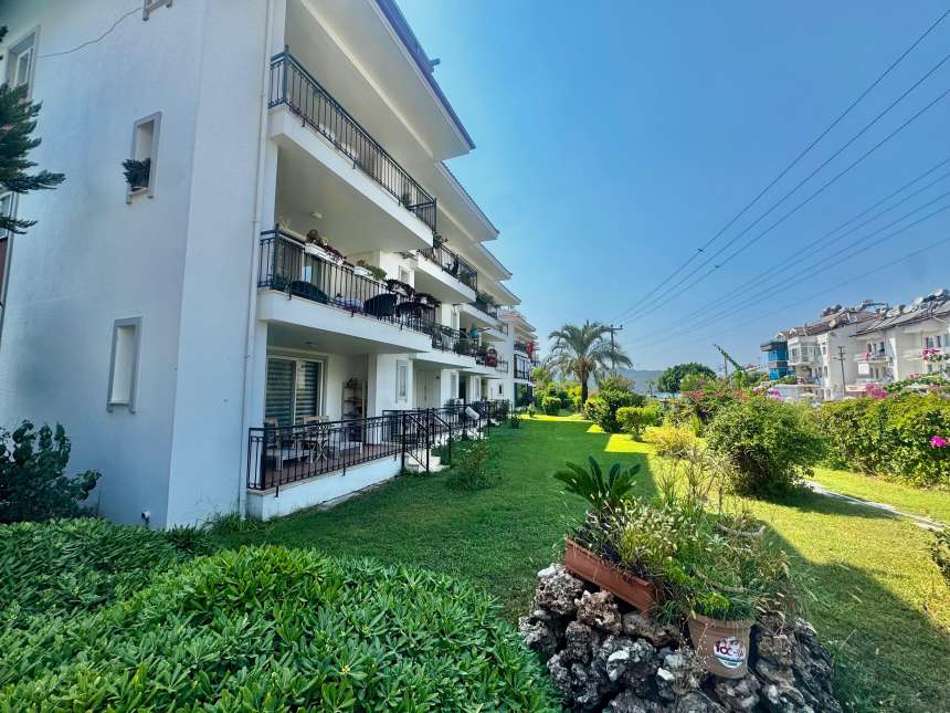 Sea View Fethiye Apartment For Sale Near The Promenade - Well-maintained social gardens