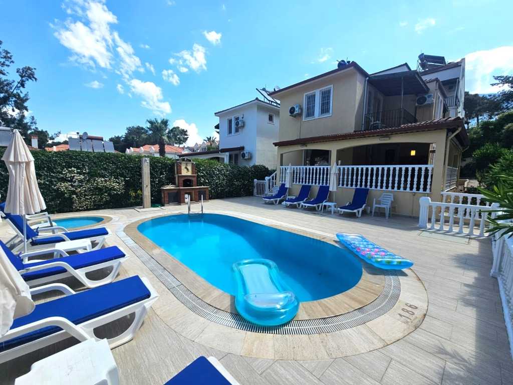 An Impressive Villa For Sale In Fethiye - Three-storey villa with pool and kids pool