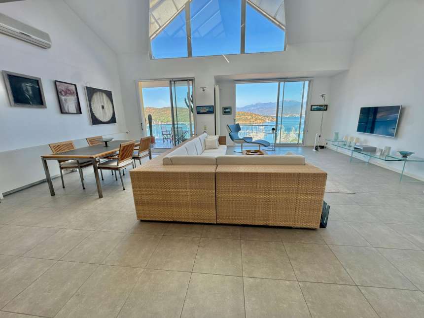 Sea-View Property For Sale In Fethiye - Living area with a huge skylight offering sea and nature views