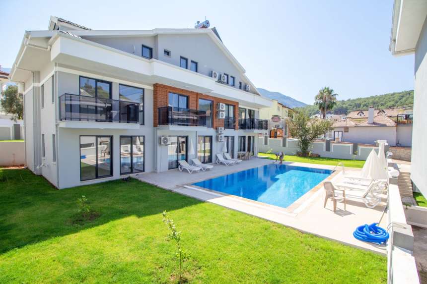 Deluxe Apartment For Sale In Ovacik, Fethiye – Shared pool and gardens