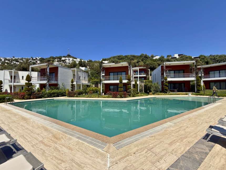 Furnished Sea-View Apartment For Sale In Bodrum – Complex with a shared pool