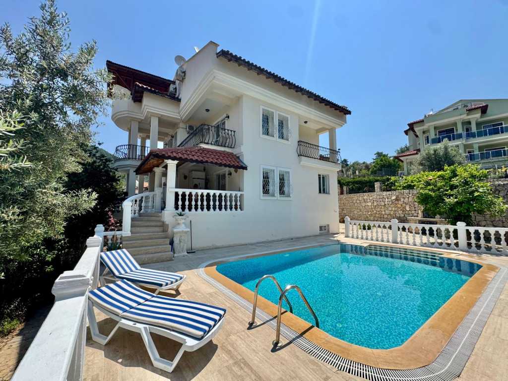 Dream Villa In Uzumlu, Fethiye For Sale - Main view of the villa, pool, and garden