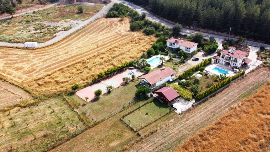 Detached Villa In Uzumlu, Fethiye For Sale - Arial view over the extensive plot and surroundings