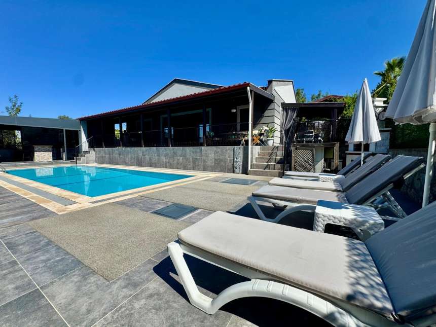 Must-See Fethiye Property For Sale - Sunbathing terraces around the pool